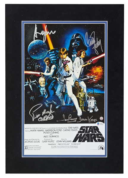 Carrie Fisher, Harrison Ford, Peter Mayhew and David Prowse Signed 10'' x 16'' ''Star Wars'' Photo of the Poster -- With Steiner COA for Fisher, Mayhew and Prowse, and Beckett COA for Ford