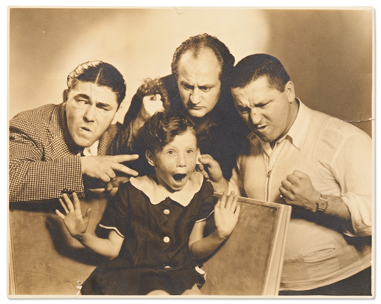 Photo of The Three Stooges Giving the Stooge Treatment to Moe Howard's Daughter Joan