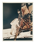 AS11-40-5868 -- Apollo 11 Photo of Buzz Aldrin Descending the Ladder Onto the Lunar Surface -- Printed on A Kodak Paper