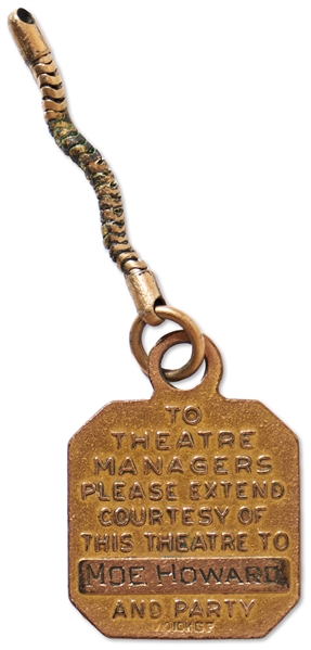 Gold Tone & Blue Enamel RKO Theatres Keychain Engraved on Back: ''To Theater Managers Please Extend Courtesy of This Theater to Moe Howard and Party'' -- Measures .875'' Square Excluding Chain -- Rare