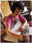 Kim Phuc Phan Thi Signed 20'' x 16'' Photo -- ''Napalm Girl'', the Face of the Vietnam War, Here Gives Witness to Her Napalm Attack in Vietnam
