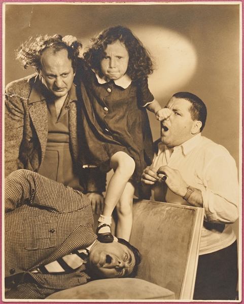 8'' x 10'' Matte Finish Portrait of Joan Howard Maurer Putting the Business to The Three Stooges -- Mounted to 9.5'' x 11.5'' Board -- Small Closed Tear and Light Creasing, Overall Very Good Condition