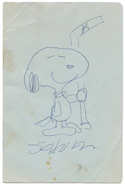 Charles Schulz Hand-Drawn Sketch of Snoopy Holding a Hockey Stick