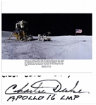 Charlie Duke Signed 20 x 16 Photo of the U.S. Flag Raised on the Lunar Surface -- With a Handwritten Inscription About the Mission: ...Apollo 16 spent more than 20 hours exploring the moon...