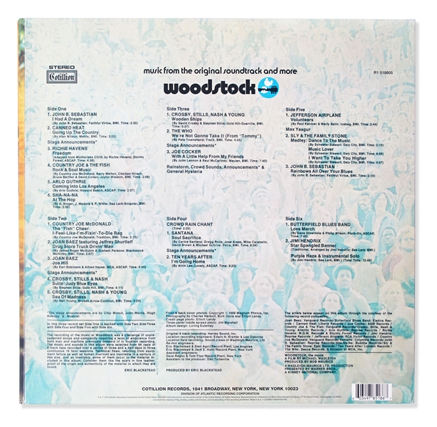 Woodstock Album Signed by Photographer Burk Uzzle & the Iconic Couple -- ''...Someone with a guitar here, someone making love there, someone smoking a joint...a bombardment of the senses...''