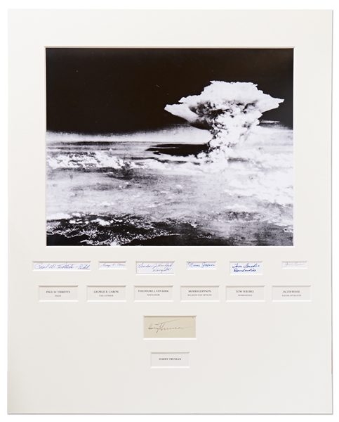 Signatures of President Harry Truman with Six of the Enola Gay Crew -- Matted with a 16'' x 20'' Photo of the Hiroshima Bombing -- With PSA/DNA COAs