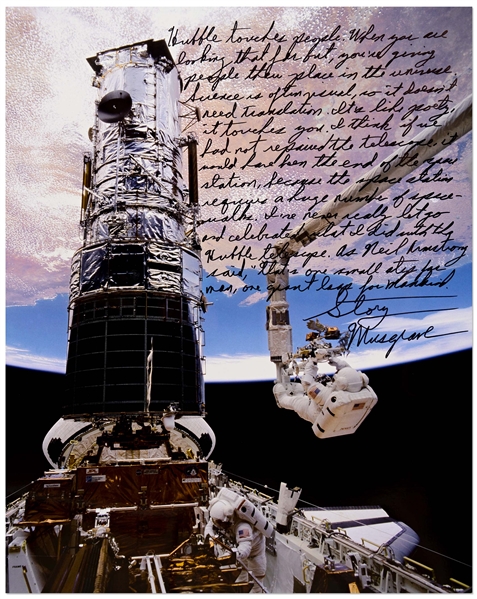 Astronaut Story Musgrave Signed 20'' x 16'' Photo of Musgrave Fixing the Hubble Space Telescope -- ''…I've never really let go and celebrated what I did with the Hubble telescope…''