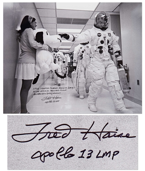 Fred Haise Signed 20'' x 16'' Photo of Apollo 10 Commander Tom Stafford Tapping Snoopy's Nose Before the Mission -- Haise Writes: ''NASA adopted Charles Schulz's Snoopy as the official...mascot''