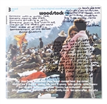 Woodstock Album Signed by Photographer Burk Uzzle & the Iconic Couple -- ...Someone with a guitar here, someone making love there, someone smoking a joint...a bombardment of the senses...