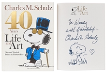 Charles Schulz Signed Snoopy Sketch, Drawn Within a First Edition of the Large Coffee Table Book 40 Years Life and Art