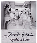 Fred Haise Signed 20 x 16 Photo of Apollo 10 Commander Tom Stafford Tapping Snoopys Nose Before the Mission -- Haise Writes: NASA adopted Charles Schulzs Snoopy as the official...mascot