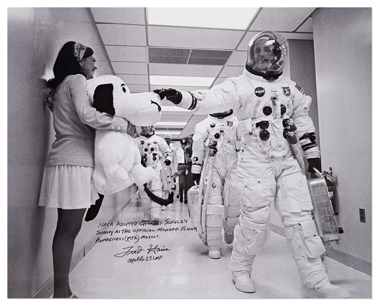 Fred Haise Signed 20'' x 16'' Photo of Apollo 10 Commander Tom Stafford Tapping Snoopy's Nose Before the Mission -- Haise Writes: ''NASA adopted Charles Schulz's Snoopy as the official...mascot''